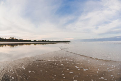 Scenic view of beach against sky