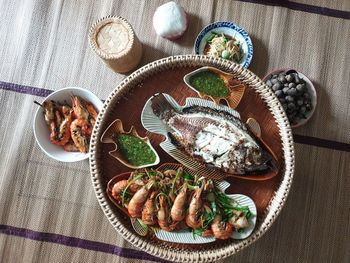 High angle view of fish in plate on table