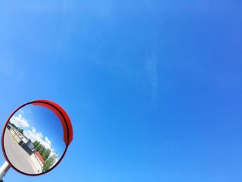 Low angle view of building against blue sky