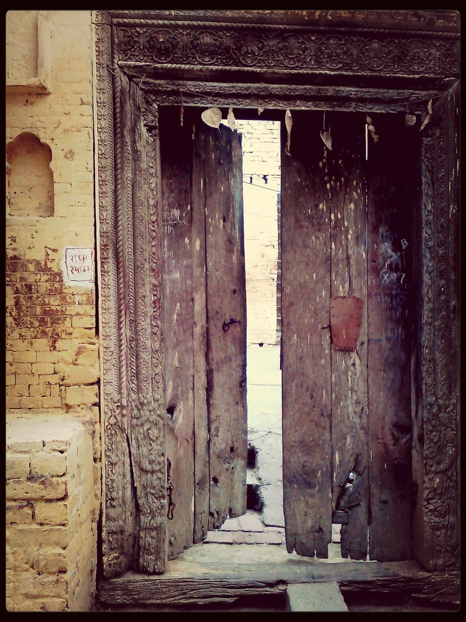 architecture, built structure, door, old, building exterior, weathered, closed, entrance, house, doorway, abandoned, damaged, deterioration, wood - material, run-down, history, obsolete, wall - building feature, window, day