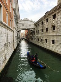 Gondola on canal in venice