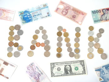 High angle view of coins