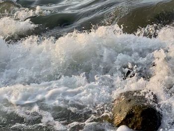 Sea waves splashing on shore