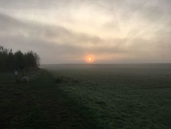 Scenic view of landscape at sunset