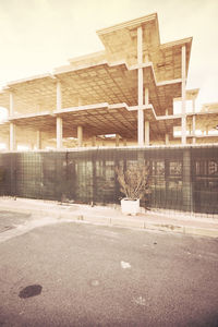 Built structure on sand against sky