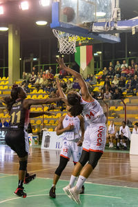 Group of people playing with ball