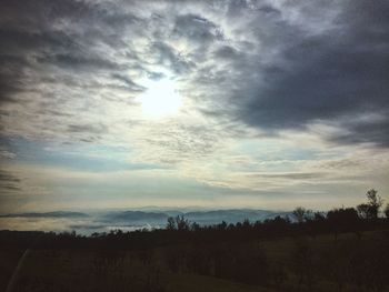 Scenic view of silhouette landscape against sky during sunset