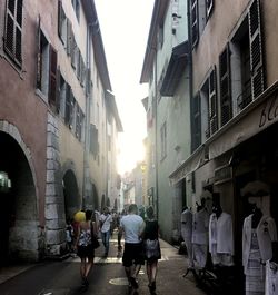 People walking on street in city