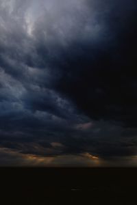 Scenic view of dramatic sky over sea