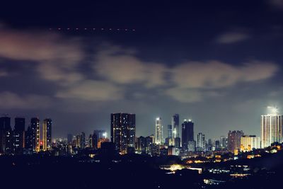 View of city lit up at night