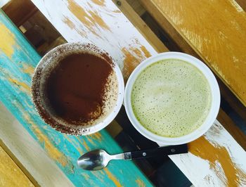 High angle view of coffee cup on table