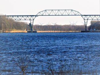 Bridge over river against sky