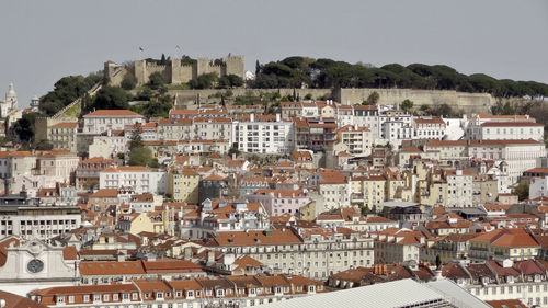 Aerial view of townscape against clear sky