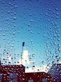 Close-up of water drops on glass