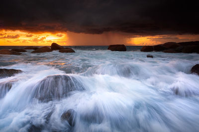 Scenic view of sea against sky during sunset