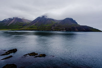 Icelandic fjord between ocean covered mountains at borgarfjordur eystri in eastern iceland