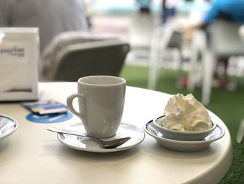 Close-up of coffee served on table