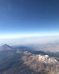 Aerial view of dramatic landscape against sky