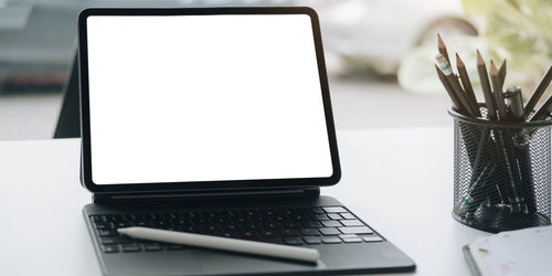 Close-up of laptop on table