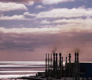 Scenic view of sea against cloudy sky