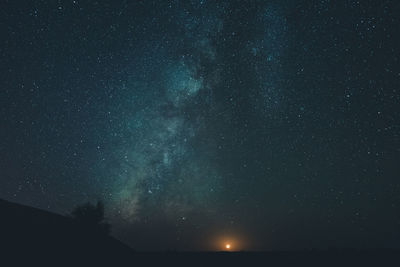 Low angle view of stars in sky at night