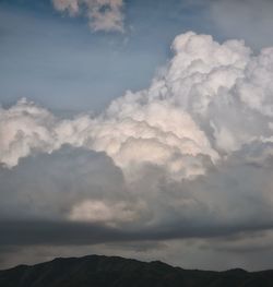 Low angle view of majestic mountains against sky