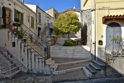 A narrow street between old buildings in melfi, a medieval village in basilicata region, italy.