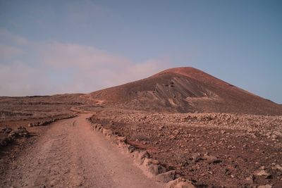 Scenic view of desert against sky