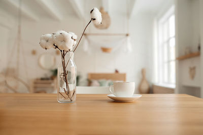 Close-up of coffee cup on table