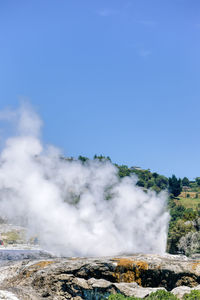 Scenic view of clouds over mountain against sky