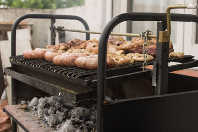 Close-up of meat on barbecue grill