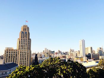 Low angle view of modern buildings against clear sky