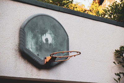 Close-up of eyeglasses on wall