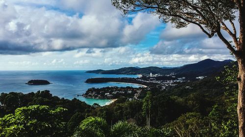 Scenic view of sea against cloudy sky