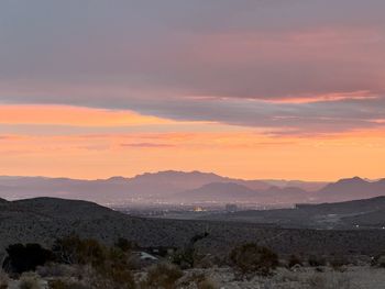 Scenic view of landscape against sky during sunset