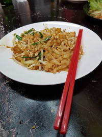 Close-up of noodles in plate on table