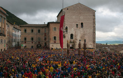 High angle view of people on building against sky