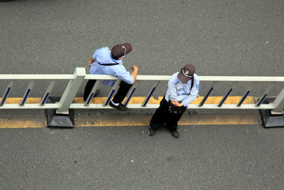 Police officers standing near barricade