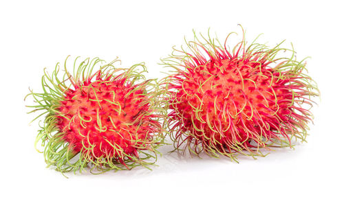 Close-up of strawberry against white background