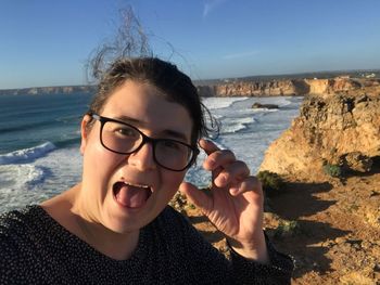 Portrait of young woman on beach