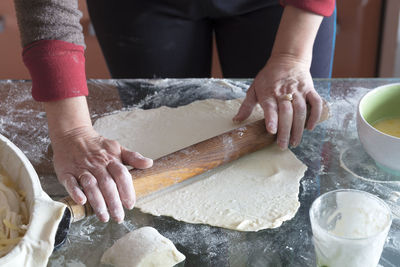 Midsection of woman preparing food