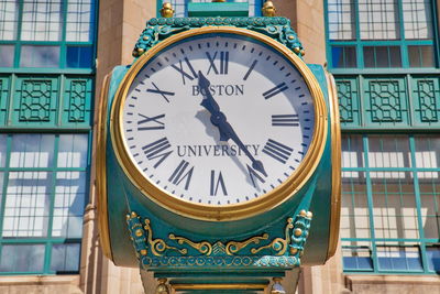 Low angle view of clock on building