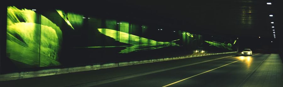 Illuminated road at night