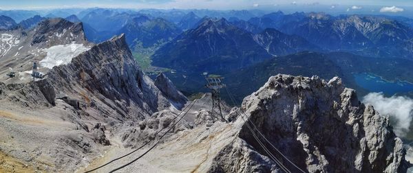 Aerial view of rocky mountains on sunny day