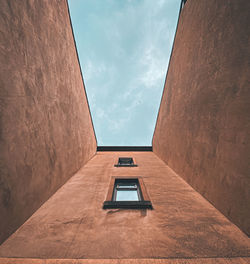 Minimalist, low angle view of building against sky