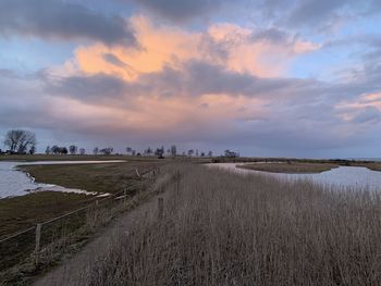 Scenic view of landscape against sky during sunset