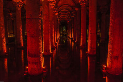 View of illuminated red building