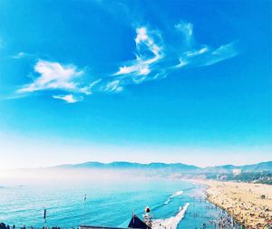 Scenic view of sea against blue sky