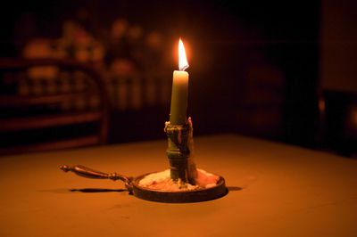 Close-up of lit candle