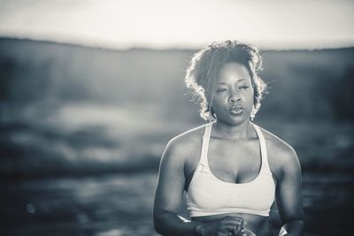 Thoughtful woman on landscape